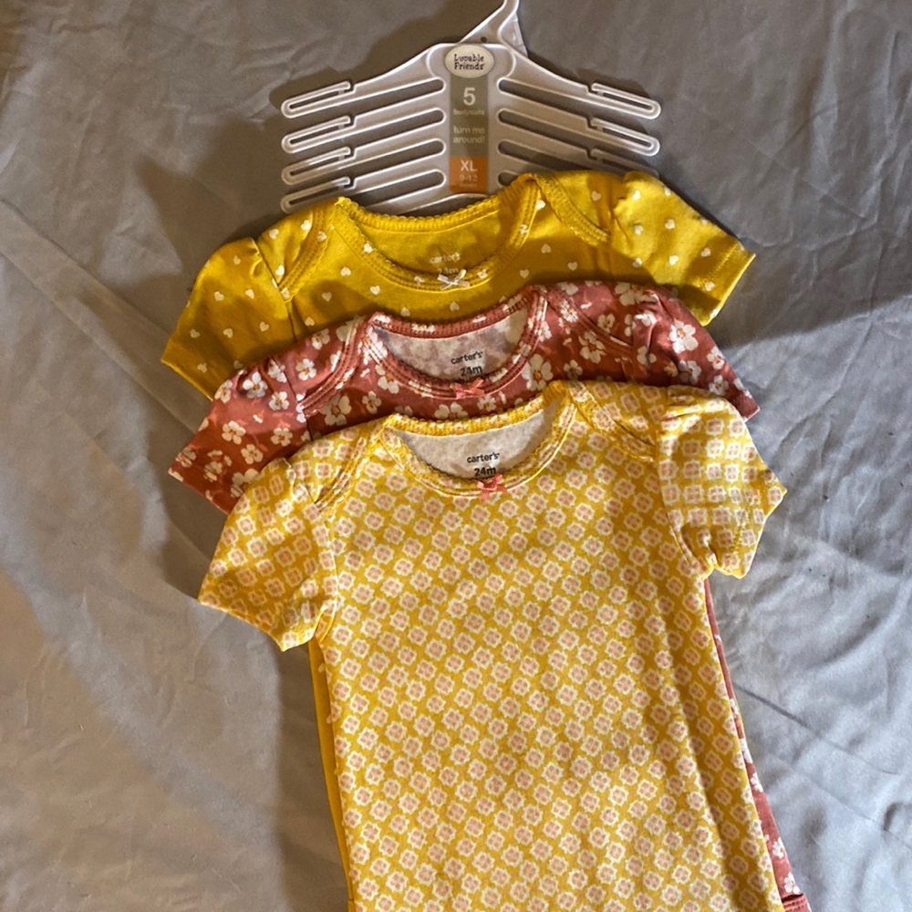 Carters onesies. 3 pieces. Never worn.